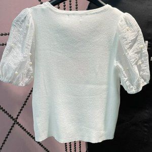 logo spell sleeve pearl knit top